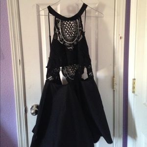 little black dress , skin revealing